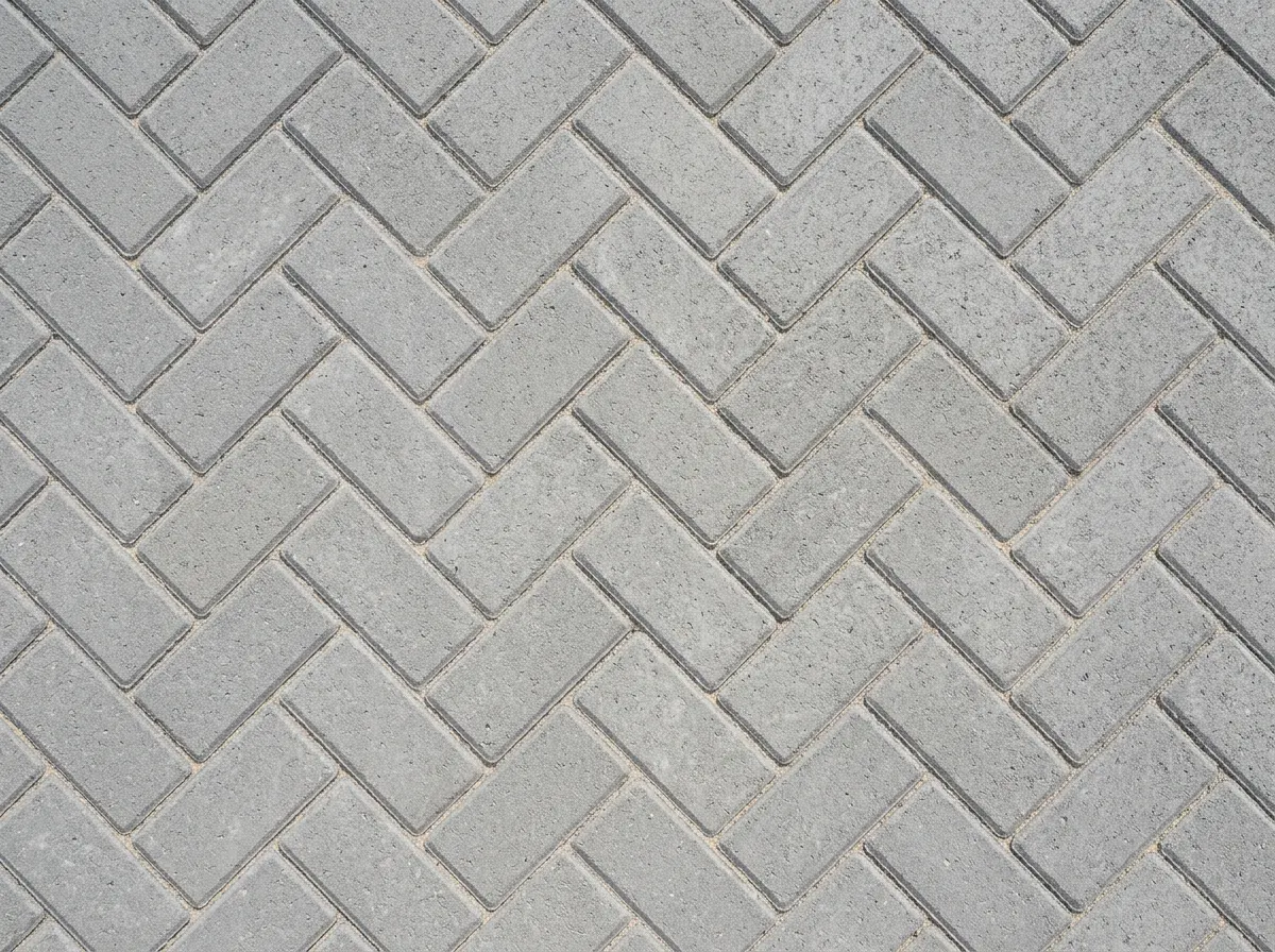 Block paved driveway in a herringbone pattern