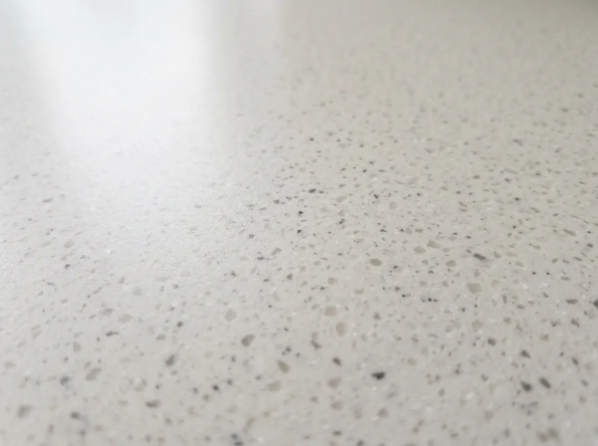 Seamless white Corian solid surface worktop featuring an integrated moulded sink