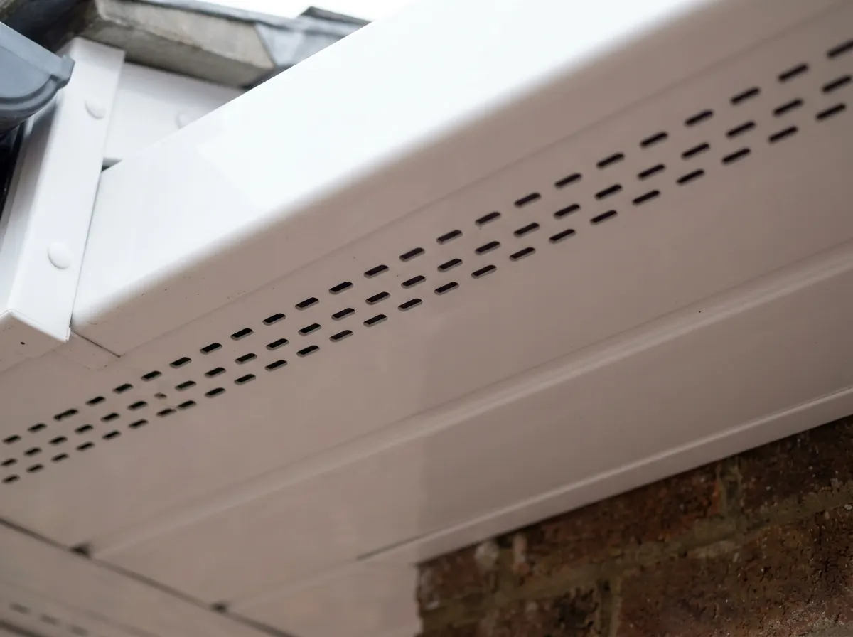 Looking up at a vented uPVC soffit board from below